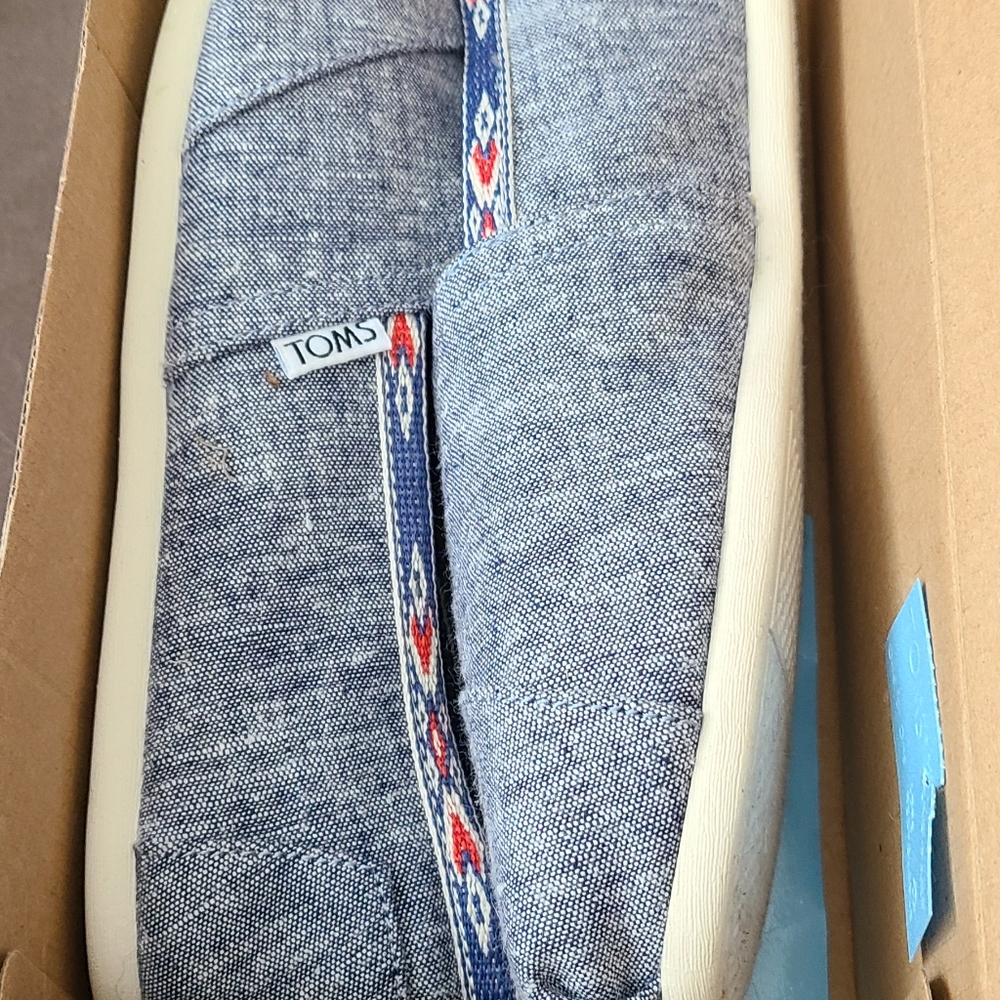 Toms with tribal trim